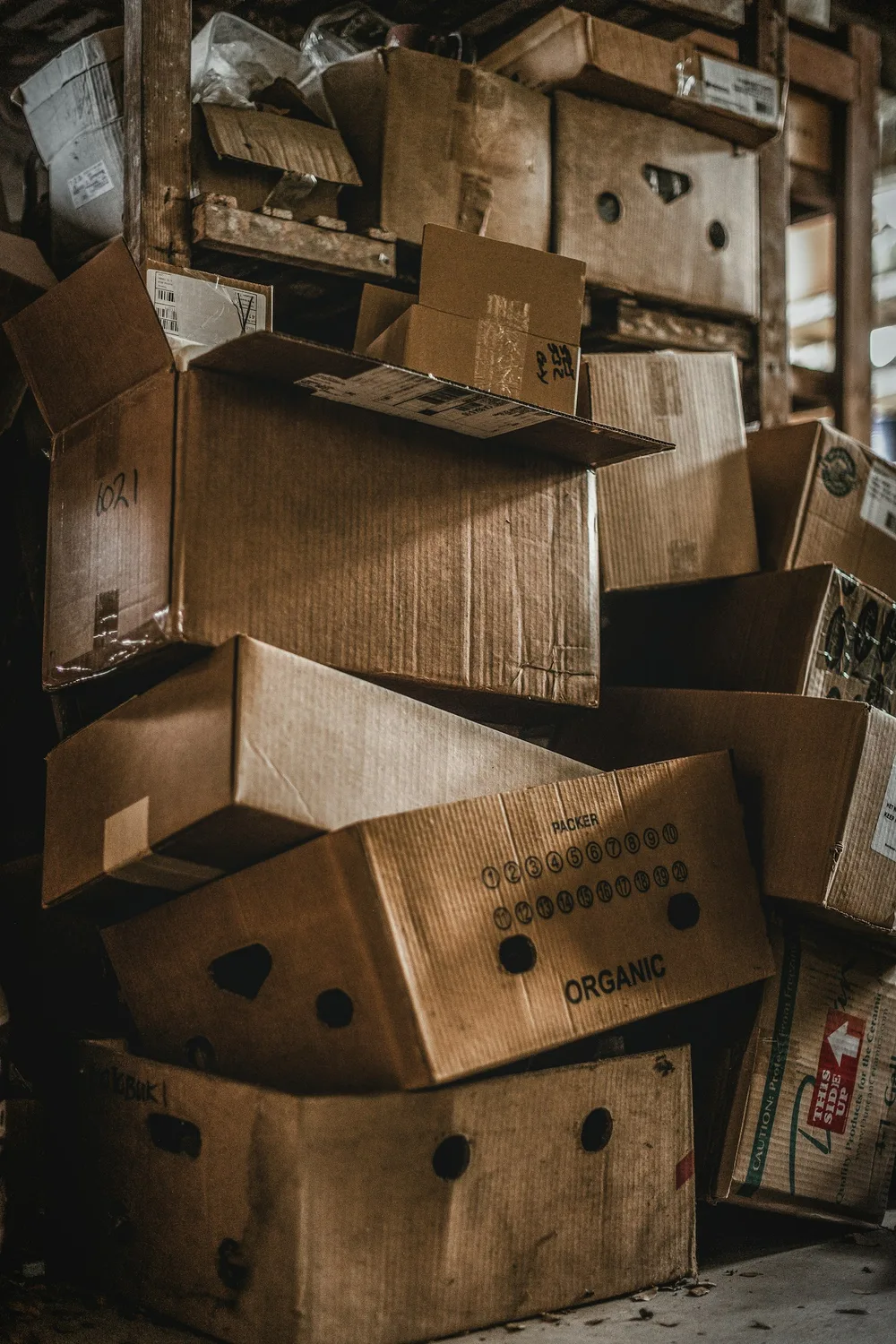 Packed cardboard boxes stacked closely